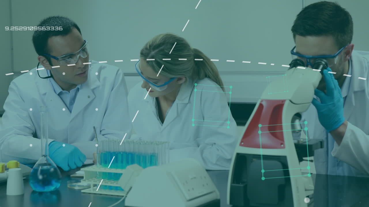 diversos científicos discuten el procesamiento de datos en un laboratorio, destacando la investigación médica.