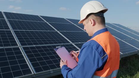inspector examination of photovoltaic modules, solar panels