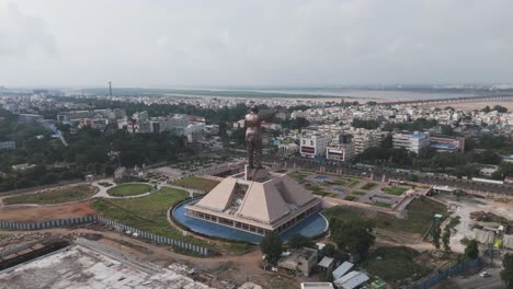 aerial view of a large statue in a city