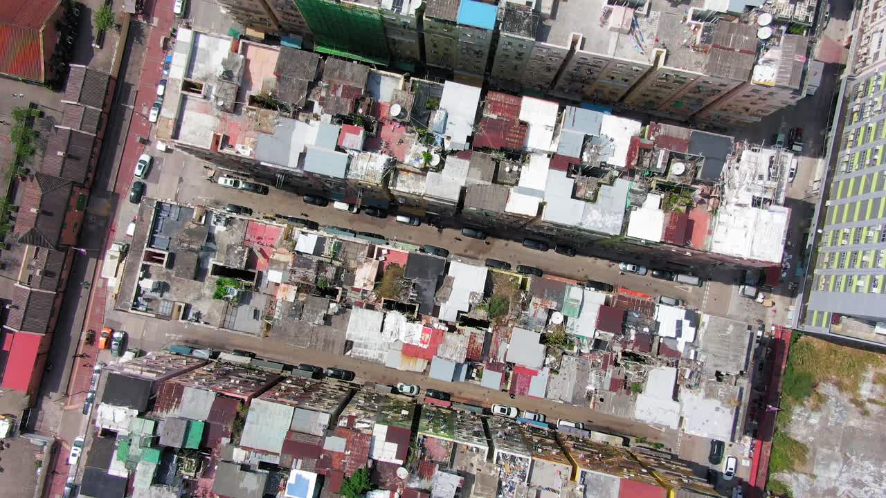 Hong Kong Kowloon Walled City, a densely populated slum, populated mostly by work immigrants, aerial view.