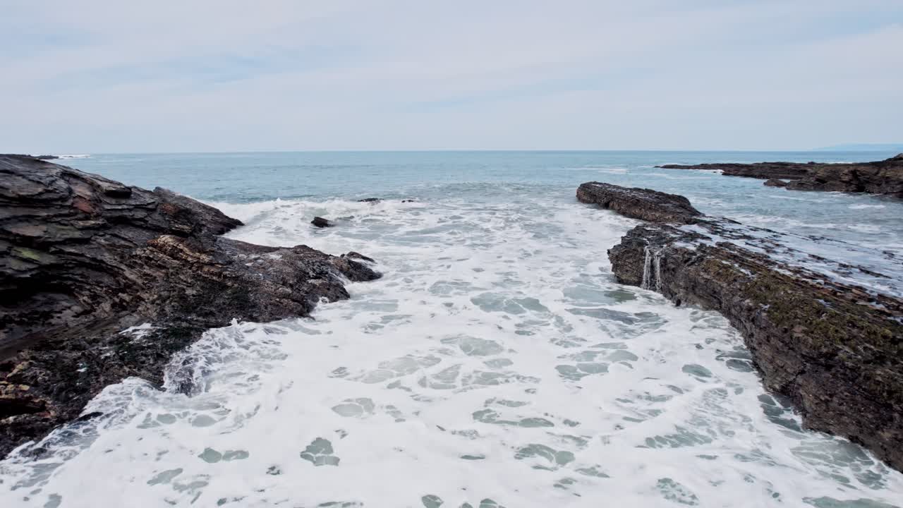 Dramatic Ocean Cliffs on the West Coast with Waves Crashing Against Rocks