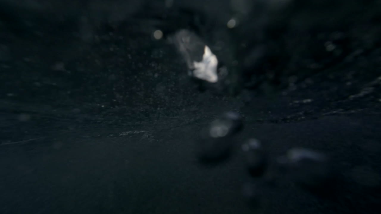 POV shot of waves crashing into shore