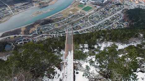 aerial view of rampestreken viewpoint with rauma river and town at andalsnes, norway