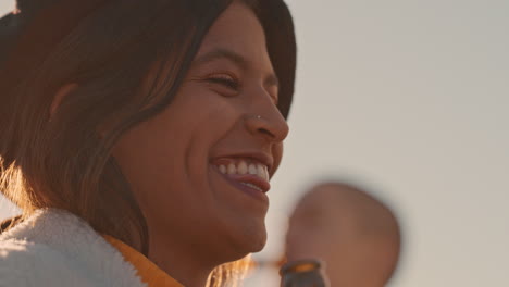 slow motion portrait beautiful young woman dancing enjoying rooftop party at sunset drinking alcohol having fun on weekend celebration with friends