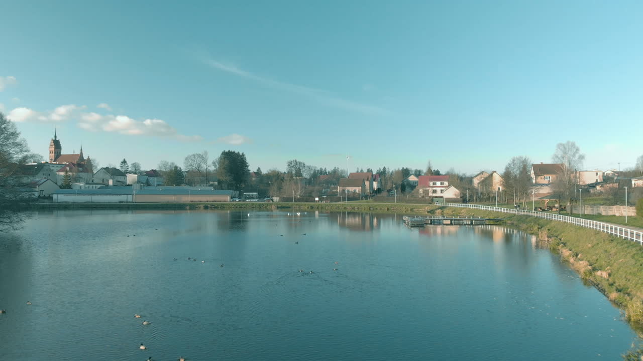 Calm water and clear sky with smal clouds, near hikking path, Quiet flight over Pond Garncarski - Górowo Iławeckie,