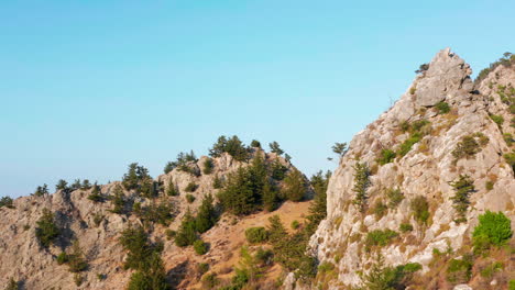 aerial tracking shot with cliff