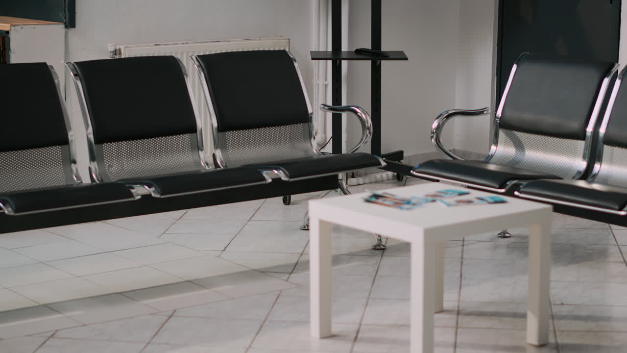 Clinical waiting room with chairs for patients to sit