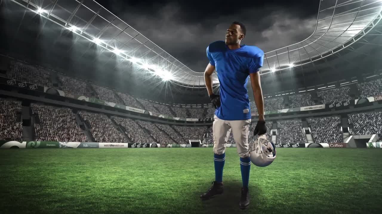 American-Football-Spieler steht aufrecht