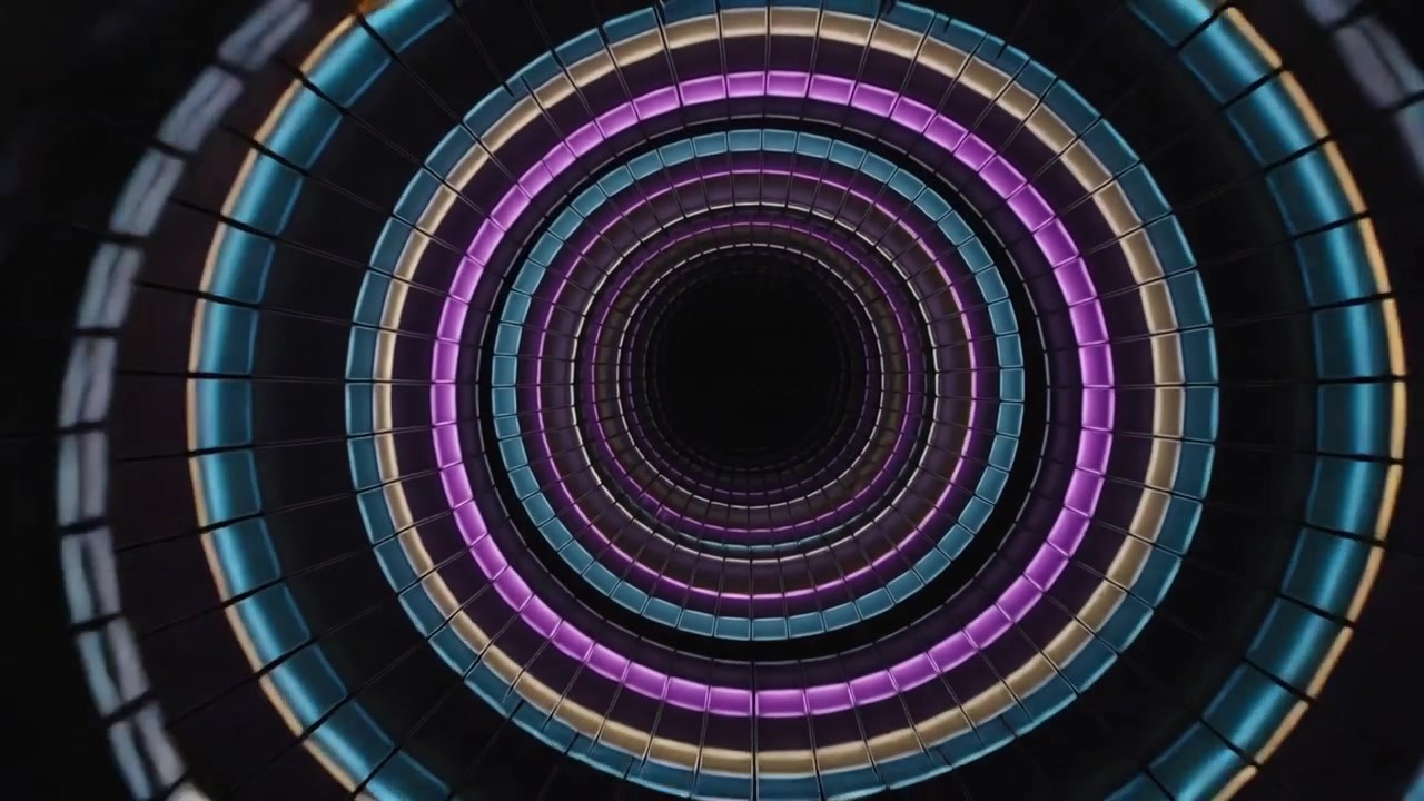 Telecamera che si inclina seguendo una colonna illuminata con fasce LED e nervature ad anello attraverso l'atrio, rivelando il vuoto.