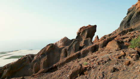 flying inside the herrera cave and revealing the landscape behind the rocks