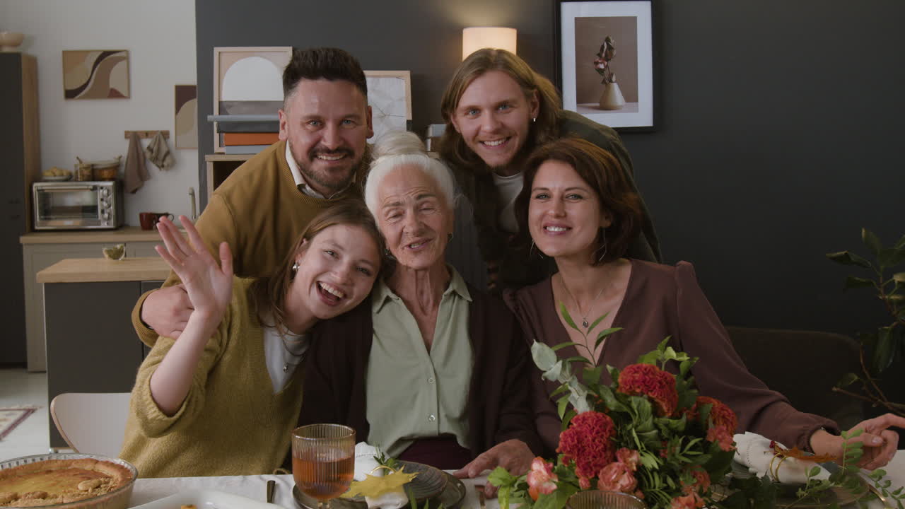 Family gathering around a dinner table
