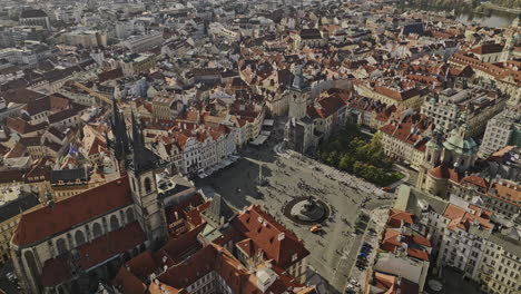 prague czechia aerial v116 birds eye view drone circles around famous old town square capturing cityscape of historical landmarks and architectural buildings - shot with mavic 3 cine - november 2022