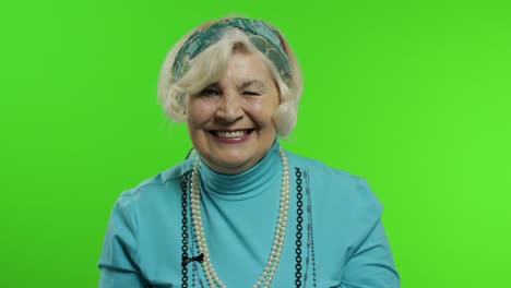 elderly stylish trendy grandmother. caucasian woman posing. chroma key