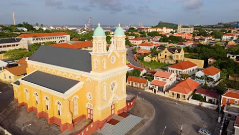 golden hour light illuminates orange chapel of santa famia church otrobanda curacao