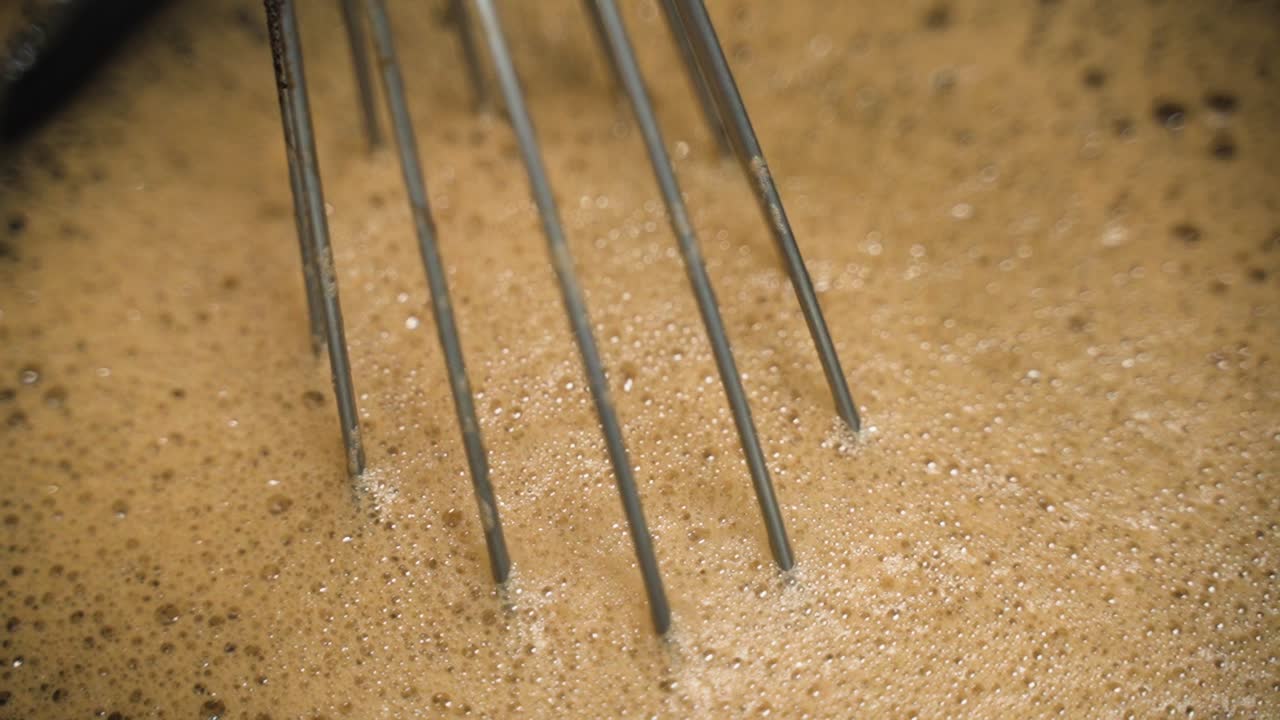 Close up of an espresso mix that will be blended into cookie dough. This was taken at a higher frame rate and has been converted to a slow motion video clip.
