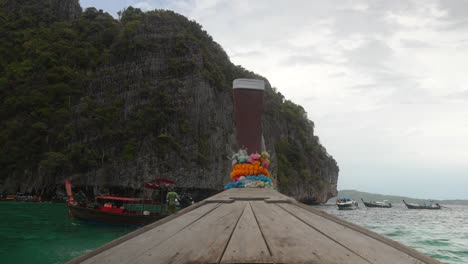 longboat with flowers at pi leh lagoon thailand phuket phi phi island