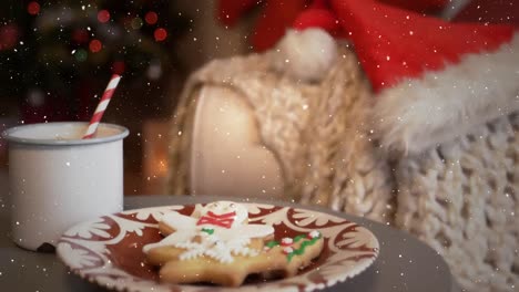 video composition with falling snow  desk with festive food