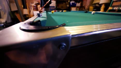 Slow-motion-pool-shot-on-a-corner-pocket