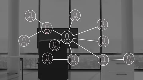 animation of network of connections with icons over office desk with computer