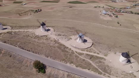 spanish windmills on a mountaintop. panoramic aerial view. don quixote. la mancha, consuegra. spain