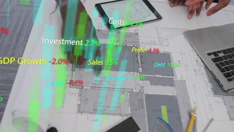 Animation-of-data-processing-over-desk-with-tablet-and-laptop