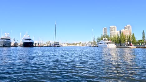 boats cruising along gold coast's scenic river