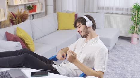 Young-man-listening-to-music-accompanies-and-enjoys-the-song.