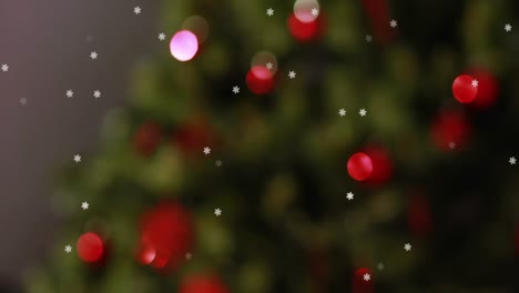 Animation-of-flickering-fairy-lights-on-christmas-tree-in-the-background