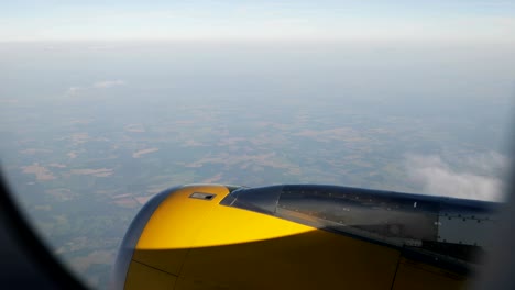 aerial view of sky over white fluffy clouds from height flight of plane