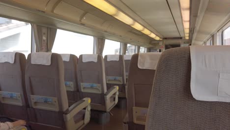 JR-Train-Seats-on-the-Inside-of-the-Wagon,-Osaka-and-Kyoto-Japan