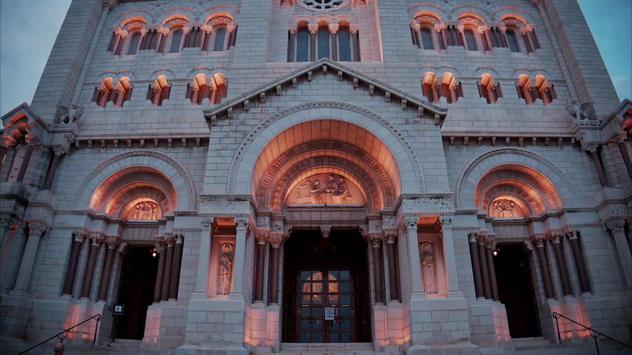 The facade of the Monaco Cathedral in the Old Town in the evening