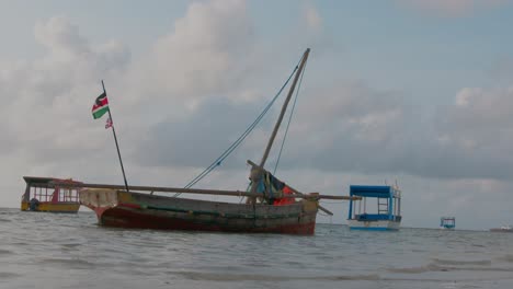 kenyan wooden boat anchored in indian ocean