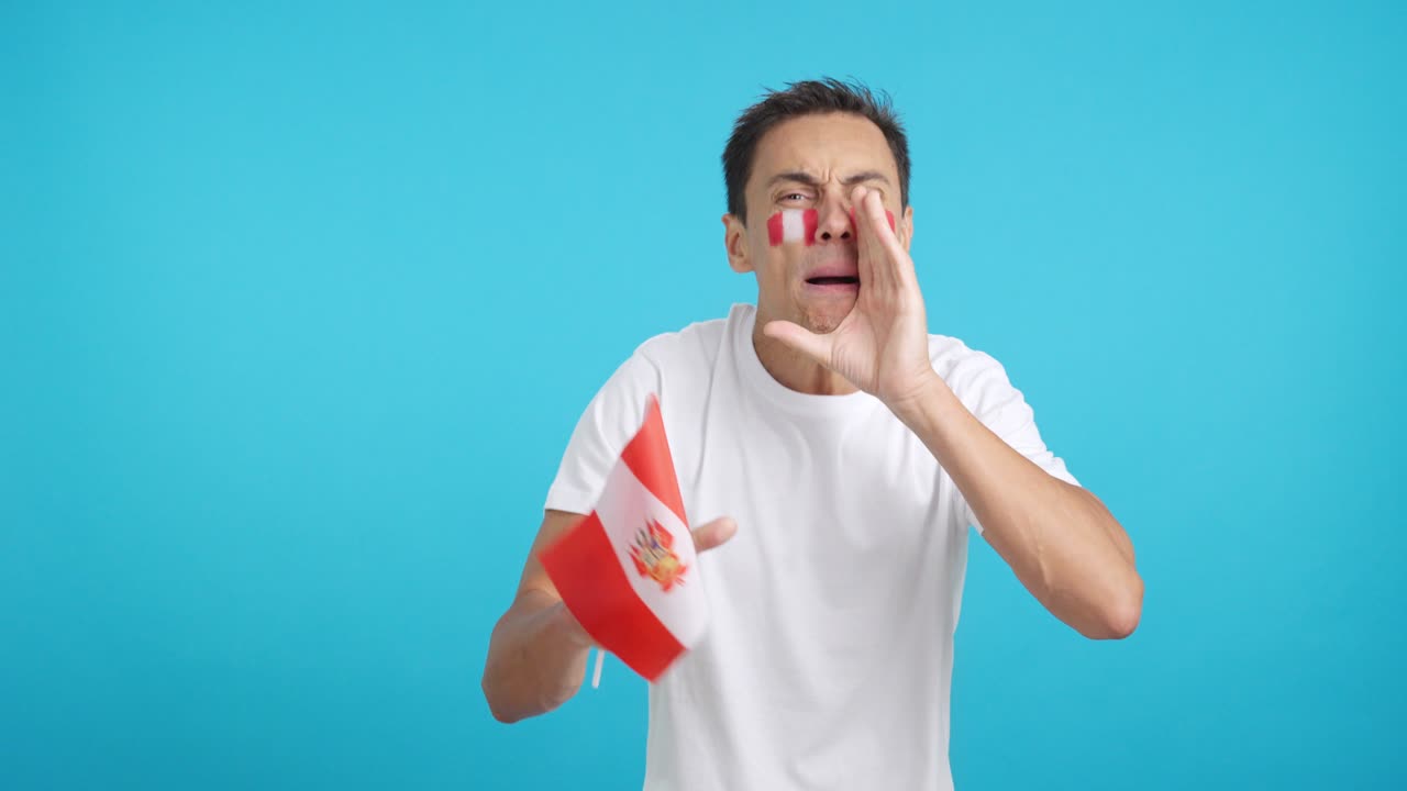 Man cheering for Peru during a match that is lost