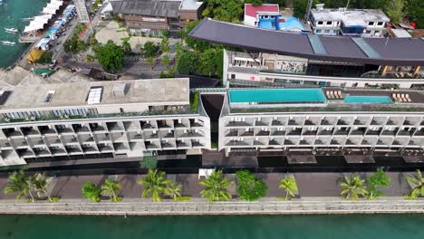 aerial view of modern hotel in waterfront city