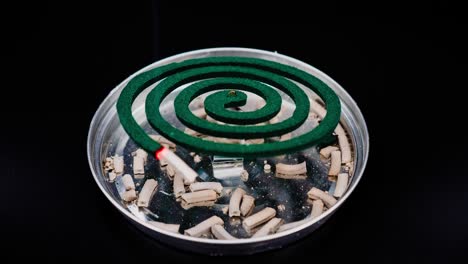 Mosquito-Coil-Repellent-timelapse-with-dark-room-Close-Up-Of-Mosquito-Coil-timelapse-at-dark-room