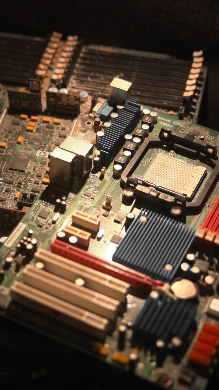 Closeup Motherboard On Black Cloth Showing Vintage Chipset, Sockets And Ram Slots Restorer Role Documenting