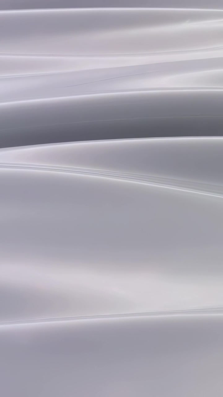 Video verticale: Bande stratificate che scorrono lentamente sullo schermo, time-lapse che mostra un movimento astratto.
