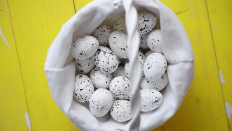 Quail-eggs-In-white-wicker-basket--The-concept-of-Easter-Holidays