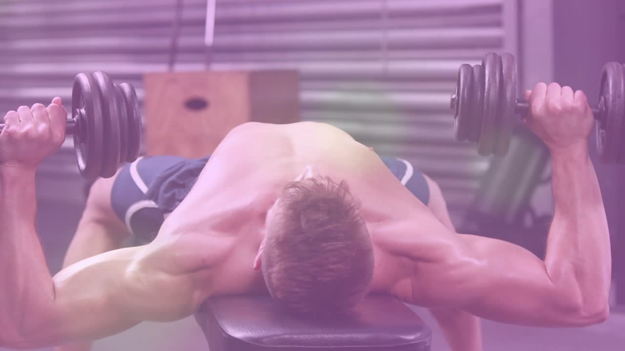Male lifter pressing dumbbells upward from chest on bench, with animated counter tracking fitness