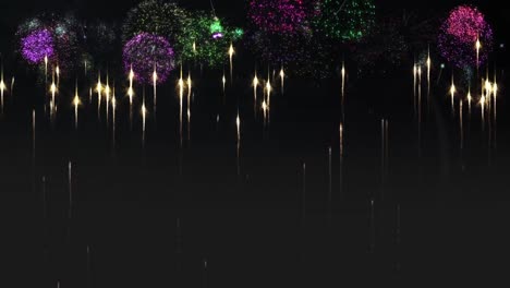 Animation-of-white-and-colourful-new-year-fireworks-on-black-background