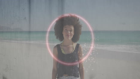 Woman modeling tech on beach, featuring pink AR ring overlay around torso for technology marketers