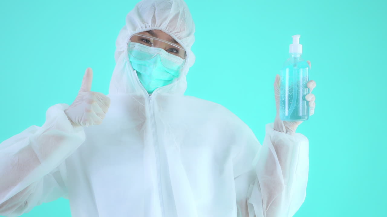 Safety doctor promoting sanitizer with joy