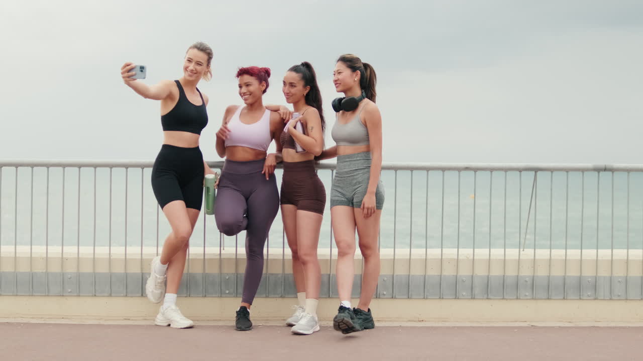 Friends Taking a Selfie After Ocean Workout