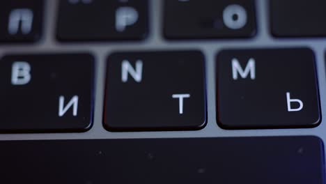 close-up of a laptop keyboard with cyrillic letters