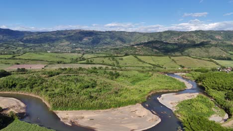 lush valley landscape under clear blue sky