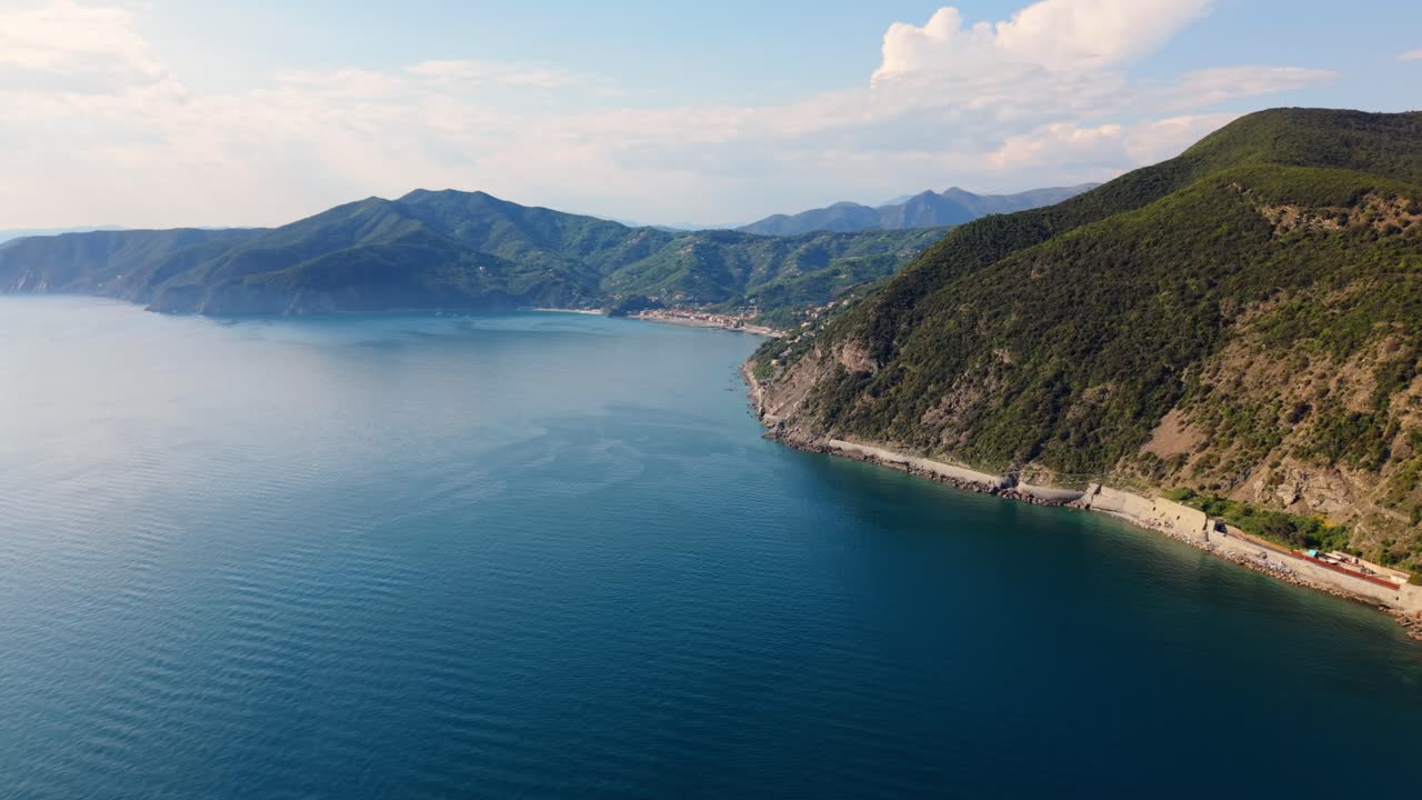 Beautiful coastal landscape of Italy with clear waters, rolling hills, and vibrant scenery