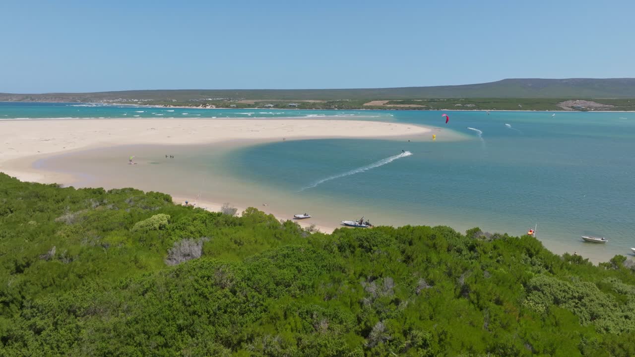 Aerial beach view in Witsand, capturing waves and sand in serene sunlit setting