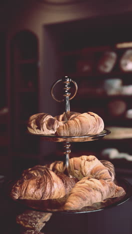 freshly baked croissants on display at a bakery