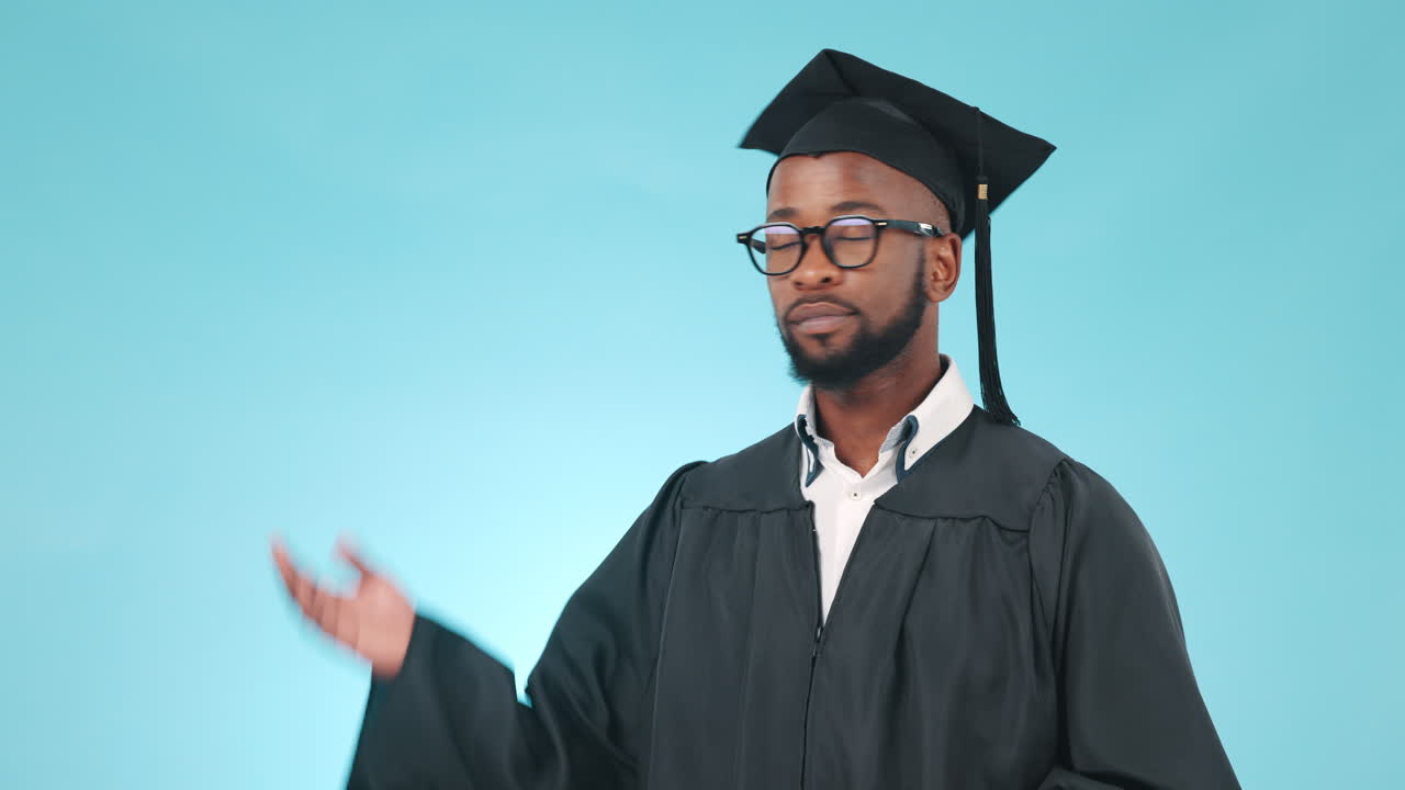 Pointing, mockup and face of man graduate