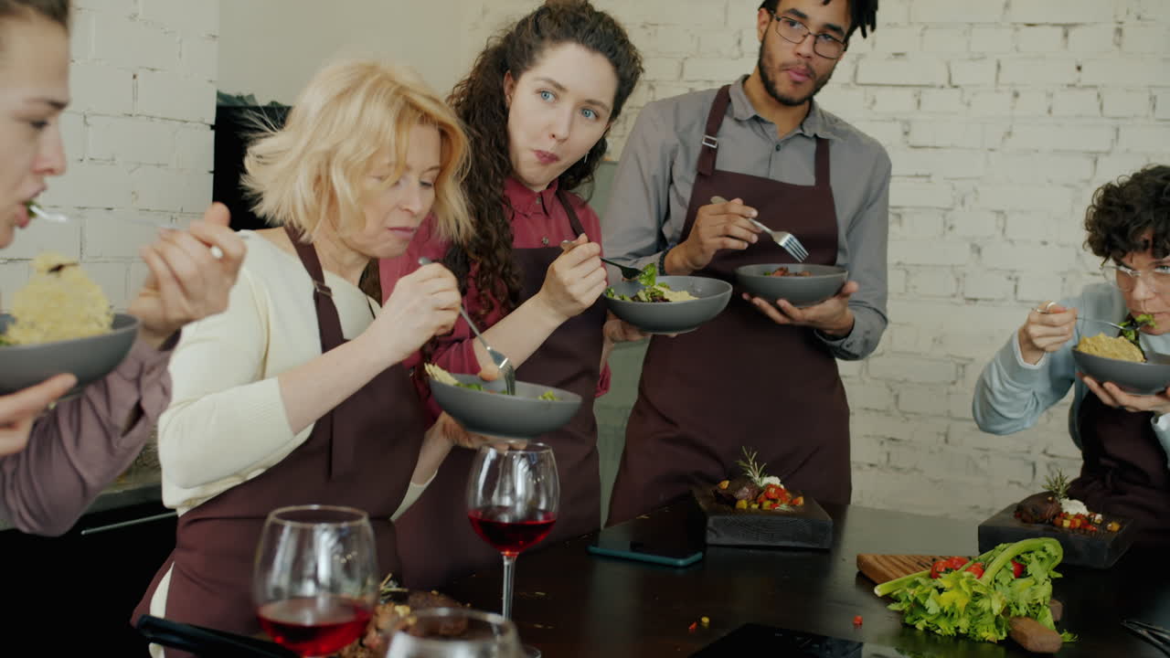 Friends Enjoying a Cooking Class Meal